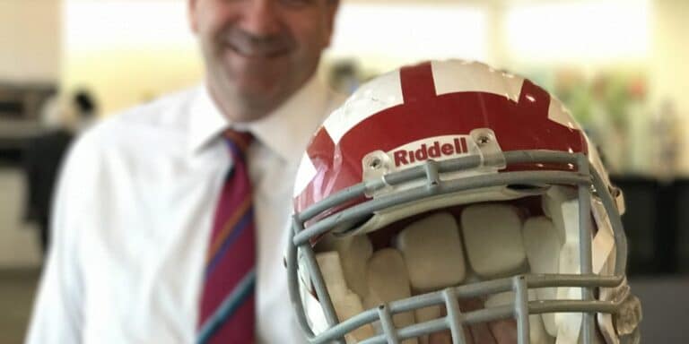 Brian Donohue holding helmet